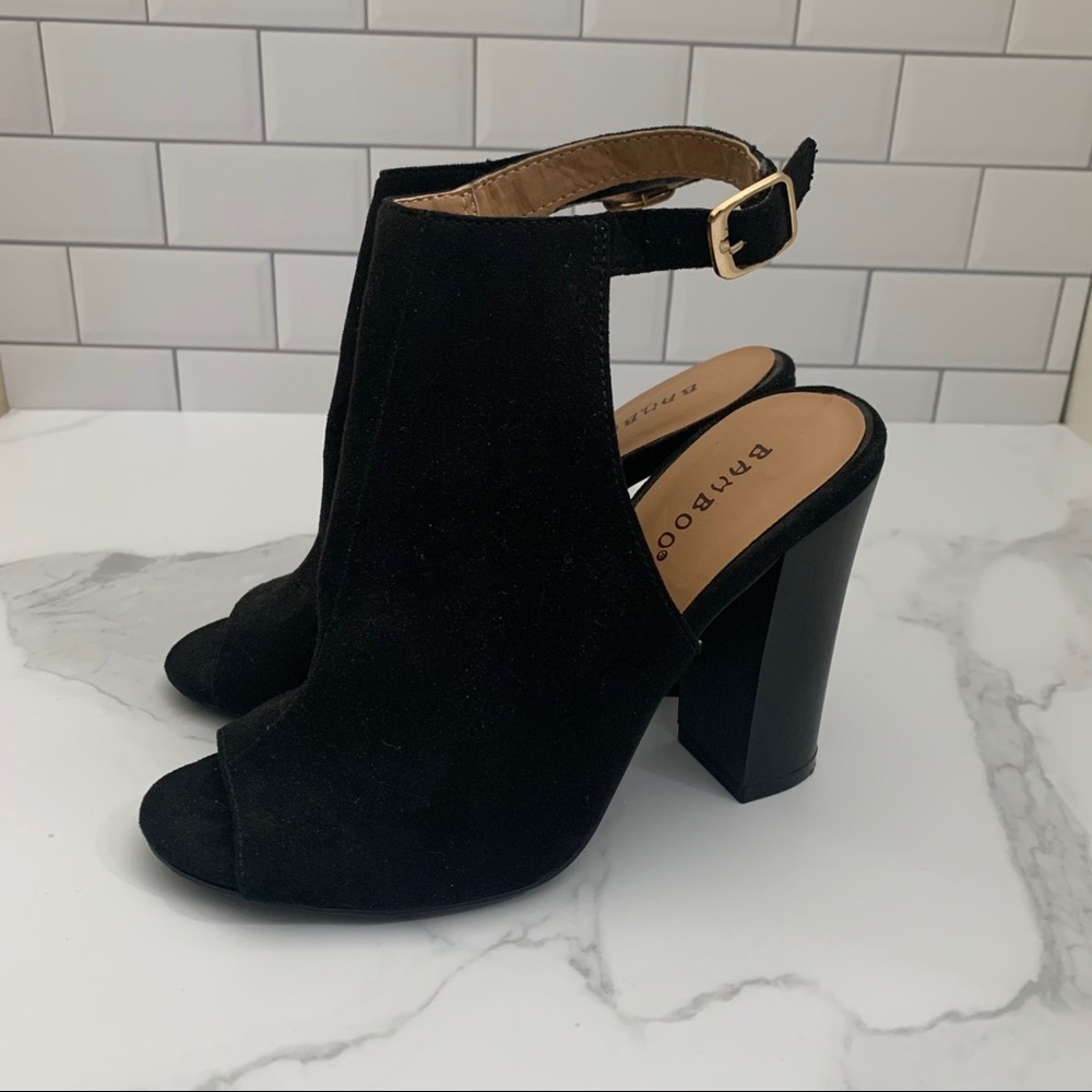 Black open toe heels. Only worn 2 times. Size 5.5